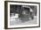 Tank Truck with Snow Plow Cleans the Streets-null-Framed Art Print