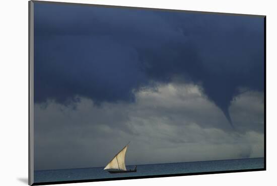 Tanzania, Zanzibar, Nungwi, Traditional Sailing Boat with Storm-Anthony Asael-Mounted Photographic Print
