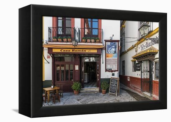 Tapas restaurant in the primary tourist neighborhood of Santa Cruz in Seville, Andalusia, Spain-Stefano Politi Markovina-Framed Premier Image Canvas