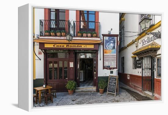 Tapas restaurant in the primary tourist neighborhood of Santa Cruz in Seville, Andalusia, Spain-Stefano Politi Markovina-Framed Premier Image Canvas