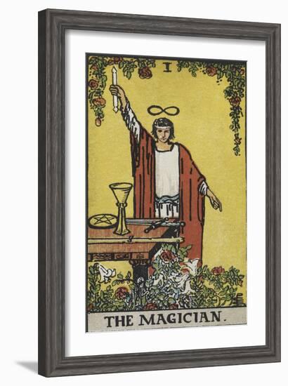 Tarot Card With a Magician Holding an Object Wearing a Red Robe, Before a Table With a Sword-Arthur Edward Waite-Framed Giclee Print