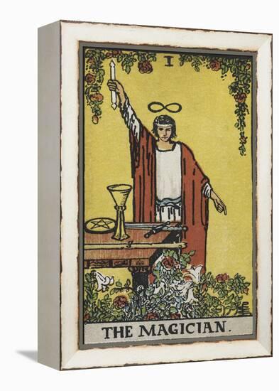 Tarot Card With a Magician Holding an Object Wearing a Red Robe, Before a Table With a Sword-Arthur Edward Waite-Framed Premier Image Canvas