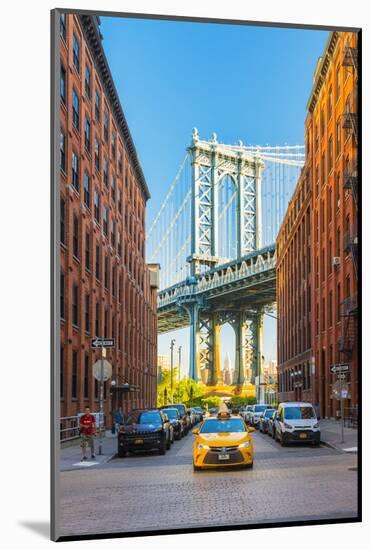 Taxi passing under the Manhattan bridge with the Empire state building framed in the bridge, New Yo-Jordan Banks-Mounted Photographic Print