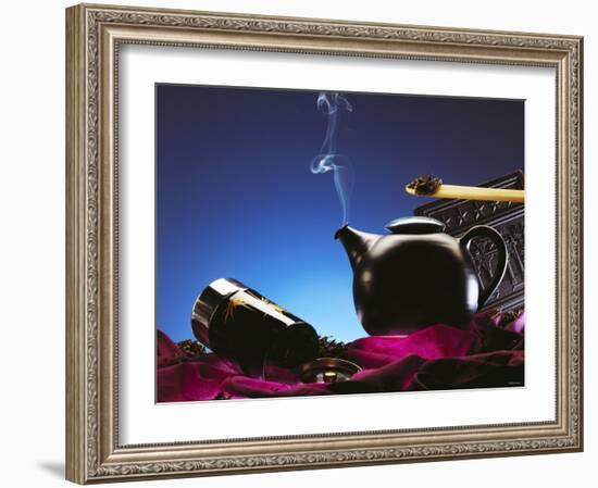 Tea Scene with a Steaming Tea Kettle and Tea Leaves-Chris Meier-Framed Photographic Print