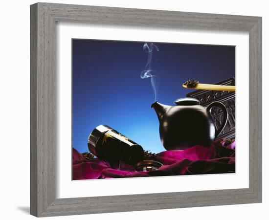 Tea Scene with a Steaming Tea Kettle and Tea Leaves-Chris Meier-Framed Photographic Print