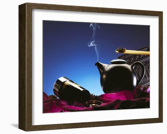 Tea Scene with a Steaming Tea Kettle and Tea Leaves-Chris Meier-Framed Photographic Print