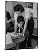 Teacher Correcting a Student's Grammar in a Book Report-Allan Grant-Mounted Photographic Print