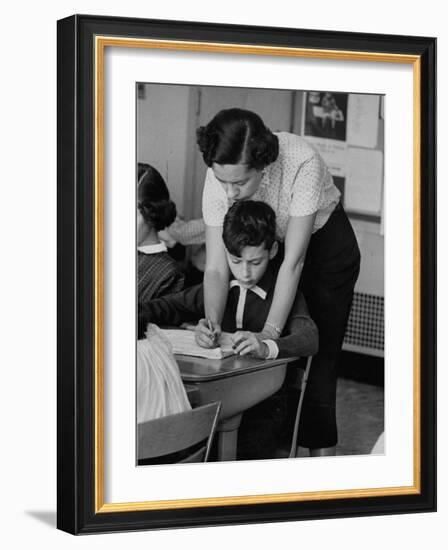 Teacher Correcting a Student's Grammar in a Book Report-Allan Grant-Framed Photographic Print