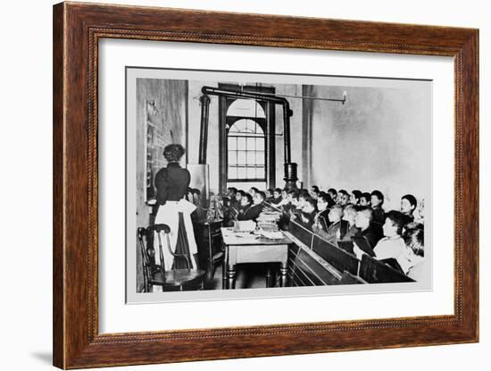 Teacher Instructs Students from Blackboard in Classroom-null-Framed Art Print