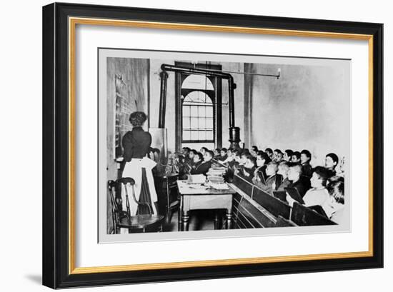 Teacher Instructs Students from Blackboard in Classroom-null-Framed Art Print