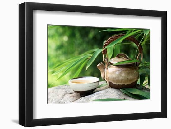 Teapot and Cups on Stone with Bamboo Leaves.-Liang Zhang-Framed Photographic Print