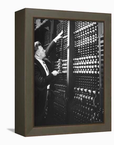 Technician Manipulating 1 of Hundreds of Dials on Panel of IBM's Room Size Eniac Computer-Francis Miller-Framed Premier Image Canvas