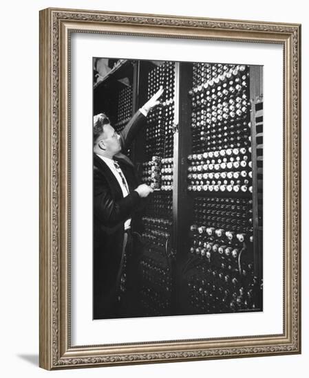 Technician Manipulating 1 of Hundreds of Dials on Panel of IBM's Room Size Eniac Computer-Francis Miller-Framed Photographic Print