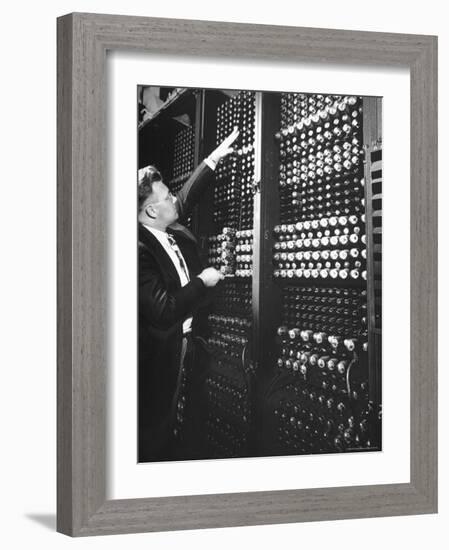 Technician Manipulating 1 of Hundreds of Dials on Panel of IBM's Room Size Eniac Computer-Francis Miller-Framed Photographic Print