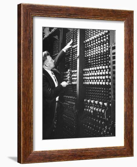 Technician Manipulating 1 of Hundreds of Dials on Panel of IBM's Room Size Eniac Computer-Francis Miller-Framed Photographic Print