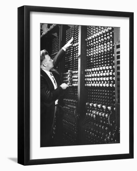 Technician Manipulating 1 of Hundreds of Dials on Panel of IBM's Room Size Eniac Computer-Francis Miller-Framed Photographic Print