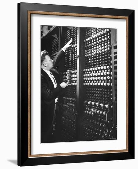 Technician Manipulating 1 of Hundreds of Dials on Panel of IBM's Room Size Eniac Computer-Francis Miller-Framed Photographic Print