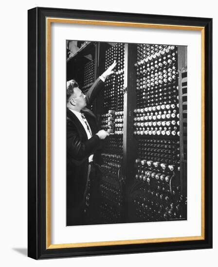 Technician Manipulating 1 of Hundreds of Dials on Panel of IBM's Room Size Eniac Computer-Francis Miller-Framed Photographic Print