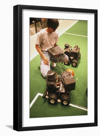 Technician Programs Robot Footballer At RoboCup-98-Volker Steger-Framed Photographic Print