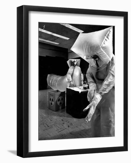 Technicians in Plastic Protective Suits and Face Masks Repair Pressure Valve at Atomic Energy Plant-Nat Farbman-Framed Photographic Print