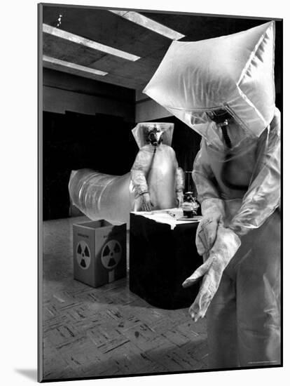 Technicians in Plastic Protective Suits and Face Masks Repair Pressure Valve at Atomic Energy Plant-Nat Farbman-Mounted Photographic Print