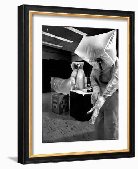 Technicians in Plastic Protective Suits and Face Masks Repair Pressure Valve at Atomic Energy Plant-Nat Farbman-Framed Photographic Print