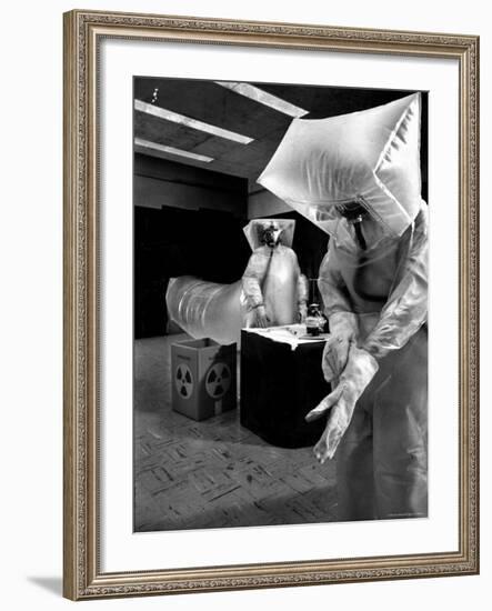 Technicians in Plastic Protective Suits and Face Masks Repair Pressure Valve at Atomic Energy Plant-Nat Farbman-Framed Photographic Print