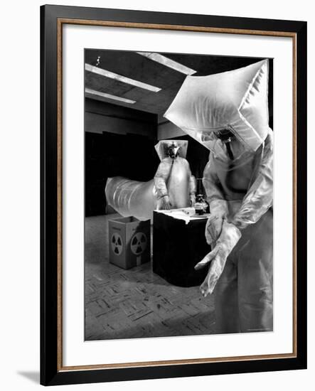 Technicians in Plastic Protective Suits and Face Masks Repair Pressure Valve at Atomic Energy Plant-Nat Farbman-Framed Photographic Print