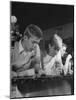 Teen Age Boys and Girls Drinking Milkshakes in Drug Store-Nina Leen-Mounted Photographic Print