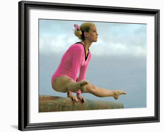 Teen Gymnast Cathy Rigby Performing on Balance Beam-John Dominis-Framed Premium Photographic Print