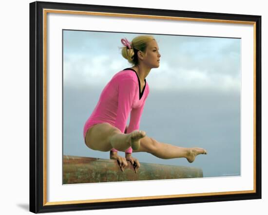 Teen Gymnast Cathy Rigby Performing on Balance Beam-John Dominis-Framed Premium Photographic Print
