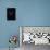 Teenage (16-17) Male Gymnast Practicing on Rings against Black Background-Thomas Barwick-Mounted Photographic Print displayed on a wall