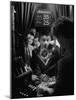 Teenage Boy Peering Into Window of Ticket Booth at a Movie Theater-Yale Joel-Mounted Photographic Print