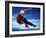 Teenage Boy Snowboarding in Mid-Air-null-Framed Photographic Print