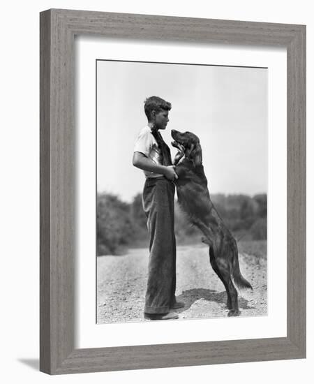 Teenage Boy with Irish Setter-Philip Gendreau-Framed Photographic Print