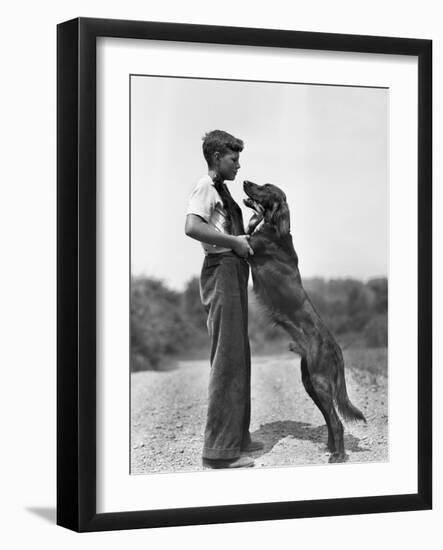 Teenage Boy with Irish Setter-Philip Gendreau-Framed Photographic Print