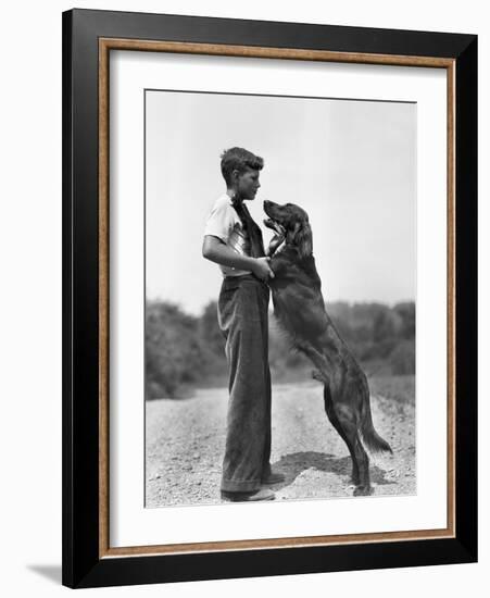 Teenage Boy with Irish Setter-Philip Gendreau-Framed Photographic Print