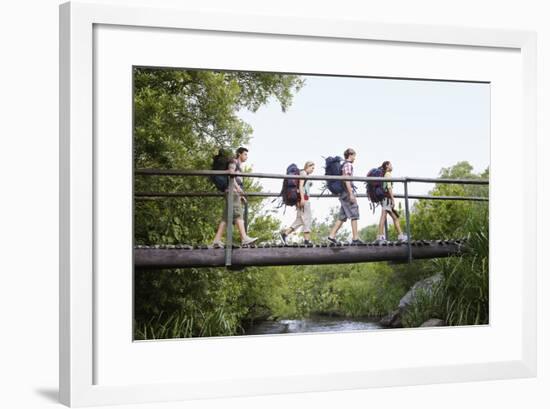 Teenage Boys and Girls with Backpacks Walking on Bridge in Forest-Nosnibor137-Framed Photographic Print