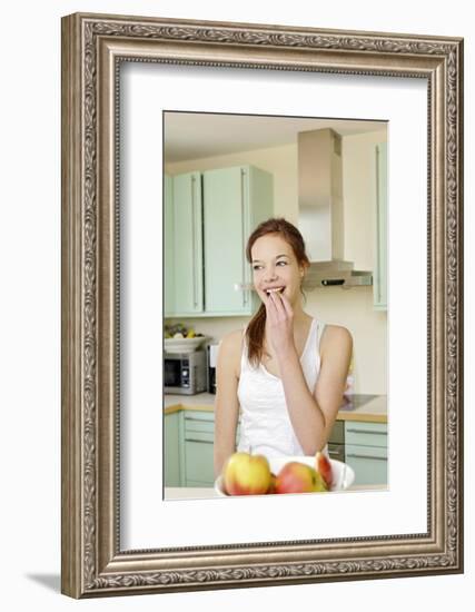 Teenage Girl Cutting Apples, Portrait, Healthy Nutrition-Axel Schmies-Framed Photographic Print