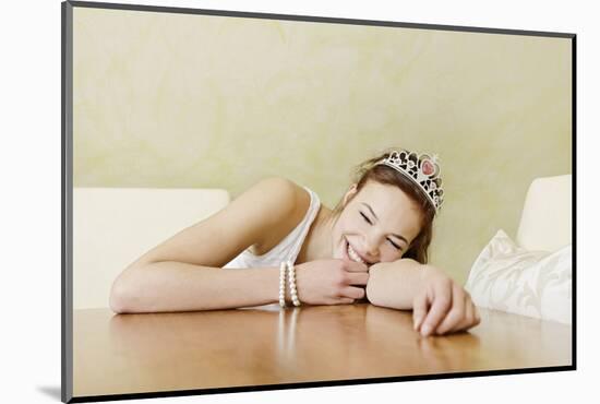 Teenage Girl Sitting with Tiara at the Table, Playing Princess, Portrait-Axel Schmies-Mounted Photographic Print