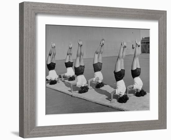 Teenage Girls from Hoover High School Standing on Their Heads in Gymnastics Class-Martha Holmes-Framed Photographic Print