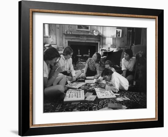 Teenage Girls Looking over their Stamp Albums-Yale Joel-Framed Photographic Print