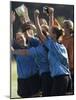 Teenage Girls on a Soccer Team Celebrating-null-Mounted Photographic Print