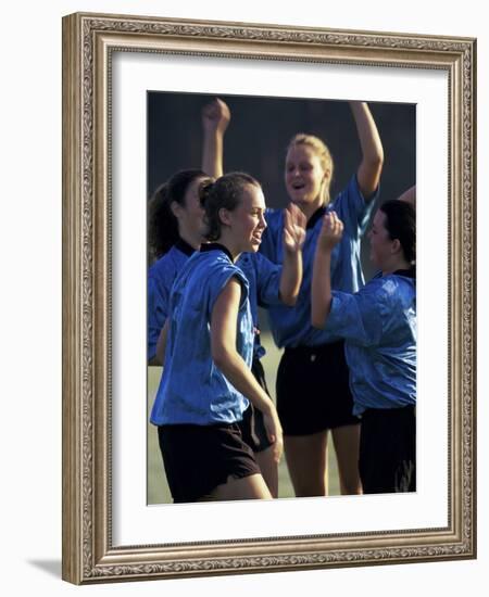 Teenage Girls on a Soccer Team Celebrating-null-Framed Photographic Print