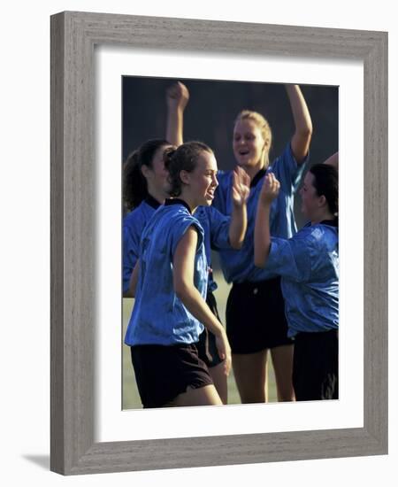 Teenage Girls on a Soccer Team Celebrating-null-Framed Photographic Print