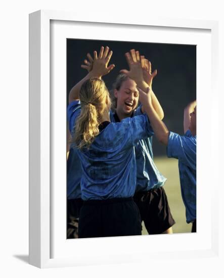 Teenage Girls on a Soccer Team Celebrating-null-Framed Photographic Print