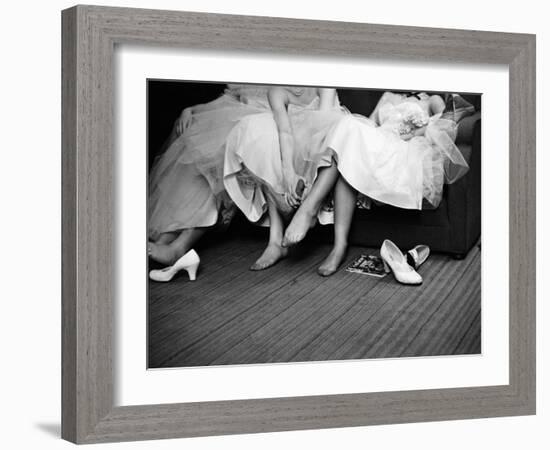 Teenage Girls Resting Feet at First Formal Dance at the Naval Armory-Cornell Capa-Framed Photographic Print