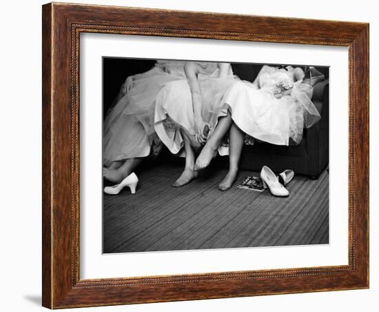 Teenage Girls Resting Feet at First Formal Dance at the Naval Armory-Cornell Capa-Framed Photographic Print