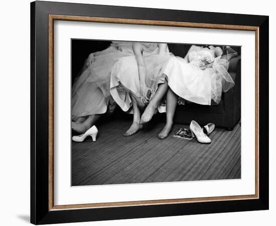 Teenage Girls Resting Feet at First Formal Dance at the Naval Armory-Cornell Capa-Framed Photographic Print