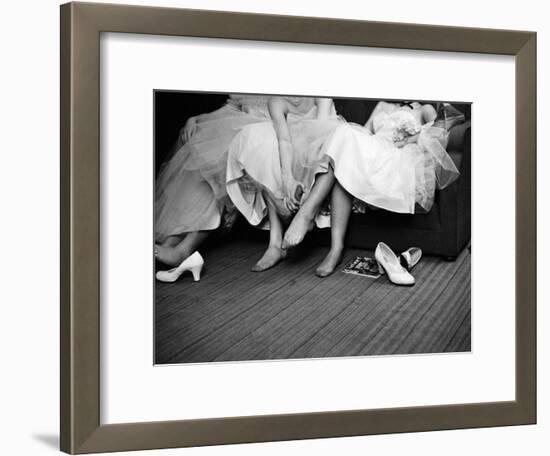 Teenage Girls Resting Feet at First Formal Dance at the Naval Armory-Cornell Capa-Framed Photographic Print